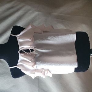 Plush pink nude sleeveless blouse with peak a boo string tie bow